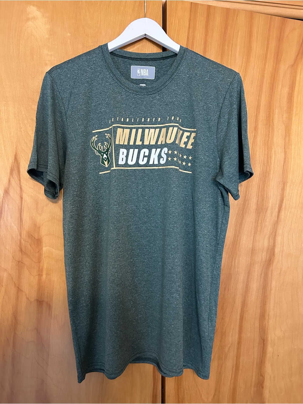 NBA Milwaukee Bucks Dark Green Graphic Tee with Gold Print
